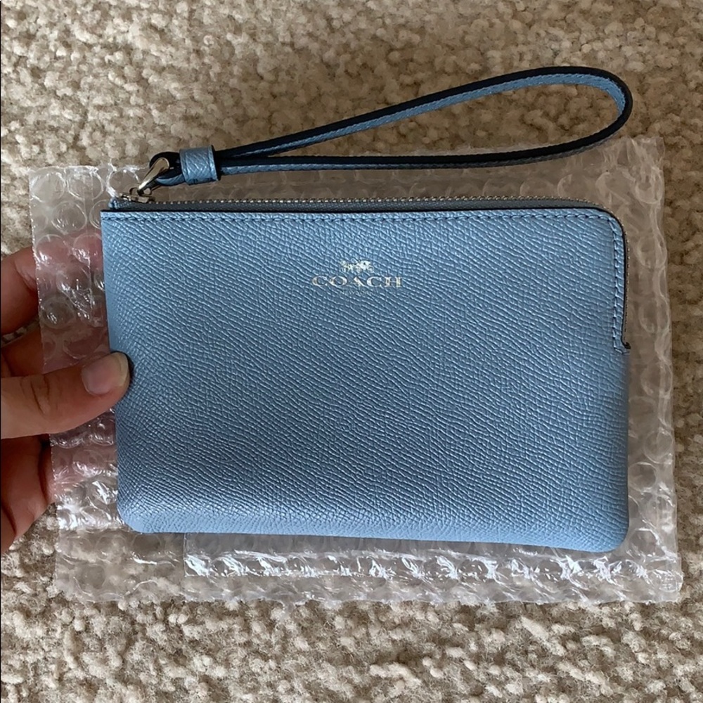 NWOT Coach wristlet.